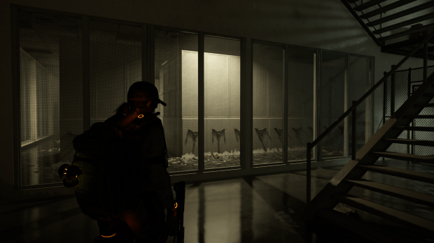 A screenshot of Tom Clancy's Division 2 that depicts flooded archival storage shelving at the NARA building.
